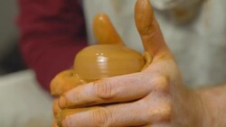 Potter makes a jug Stock Footage