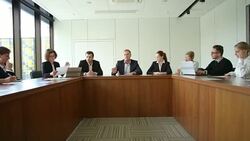 Business People at corporate meeting Stock Footage