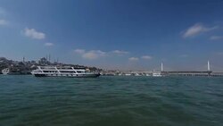 Tourist cruisers sailing near pier, great landmarks of Istanbul, gorgeous view Stock Footage