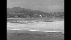 Fighting along frozen Han River with shots of smoldering, war-torn Seoul in distance, February 1951 News Clip