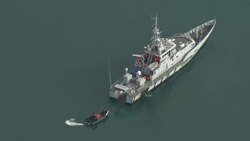 UK: UK Boarder Force vessel intercepting a migrant boat in the English Channel News Clip