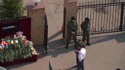 CLEAN : Russians in Kazan mark day of mourning after school shooting News Clip