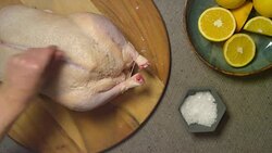 Seasoning Christmas Duck with Salt Stock Footage