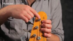 How to String a Bass Guitar & Stretch Bass Strings Instructional Video
