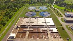Aerial view to sewage treatment plant. Grey water recycling. Waste management theme. Stock Footage