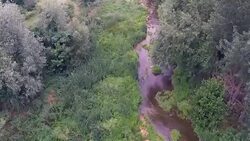 Flying above dry river bed - Stock Video Stock Footage
