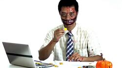 Devil eating golden coin in halloween themes Stock Footage