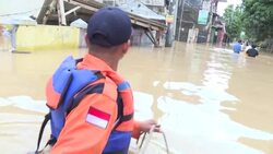 CLEAN : Indonesia floods leave two dozen dead several missing News Clip
