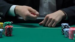 Venturous man throwing dices, pair of sixes, lucky day to win fortune, slow-mo Stock Footage