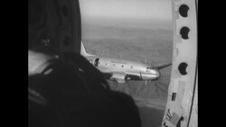 During Korean War, USAF Fairchild C119-Flying Boxcars drop supplies to US soldiers working on emergency airstrip in South Korea News Clip