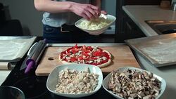 Young woman preparing pizza Stock Footage