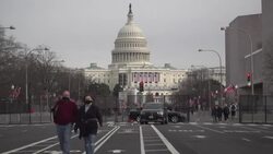 CLEAN : Washington residents take a stroll amid troops, fences and checkpoints News Clip