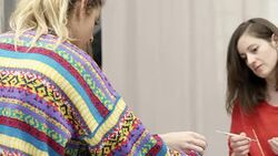 Teacher and students making pottery in studio Stock Footage