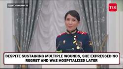 Putin HUGS Woman Military Officer, Calls Her 'Petite Girl' After She Braved Ukrainian Rocket Attack News Clip