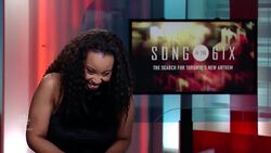 Britney Davis learns she is the winner of CBC Toronto's Song in the 6ix News Clip