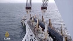 Western nations hit back with sanctions for Russia's Ukraine actions News Clip