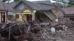 Wrecked homes, vehicles, in Carita; Serang driving shot Instructional Video