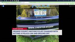 Authorities: Motorcyclist charged after hitting police car, fleeing scene Instructional Video