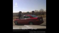 Video shows US police officer clinging to suspect’s speeding car News Clip