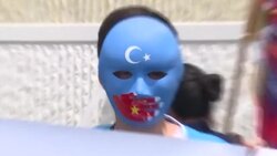 CLEAN : Dozens of Uighurs, Tibetans protest the Beijing 2022 Winter Olympics News Clip