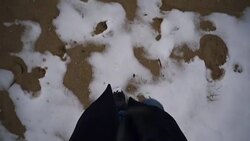 Vintage footage man walks on snow and sand - Stock Video Stock Footage
