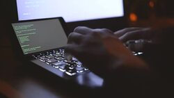 Hacker and keyboard Stock Footage