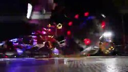 Colorful spinning wheel in amusement park at night Stock Footage