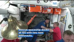 SpaceX rescue mission to bring stranded astronauts back to Earth docks at ISS News Clip