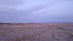 Aerial Drone Footage of Semi-Trucks Rolling Down the Highway Stock Footage