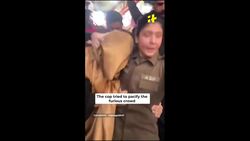 Watch Female Cop Rescue Pakistani Woman Escape Mob Angry Over Her Attire News Clip