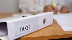 Accountant in the Office Working with Tax Forms Stock Footage