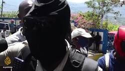 Haiti police stations stormed to free detained officers News Clip
