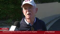 Thousands flee fast-moving wildfire in Los Angeles News Clip
