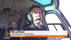 Firefighters race to contain LA wildfires as winds expected to pick up News Clip