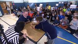 Oceanside roars for News 12's Paper Football Super Bowl VIII News Clip