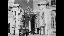 BOY SITS AT TABLE, IN CHRISTMAS JUMPER TALKS TO MAN. Stock Footage