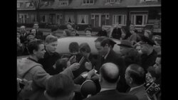 Actress Audrey Hepburn and husband actor Mel Ferrer arrive; she visits paraplegic veterans; he autographs News Clip