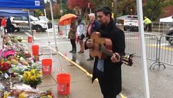 Musician sings at Pittsburgh makeshift memorial Instructional Video