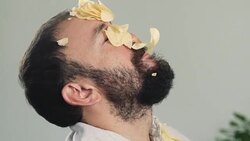 Eating potato chips in slow motion Stock Footage