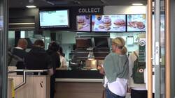 Shots of McDonalds as company apologises after staff allege they were sexually harassed News Clip