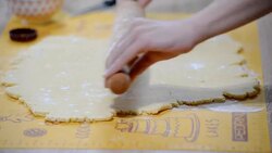 Woman's hands roll the dough. Making cookies. Stock Footage