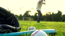 Baseball Game from Grass - Batter Hits Pitch Stock Footage