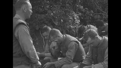 During Korean War, US Marines attending religious service outdoors somewhere in South Korea News Clip
