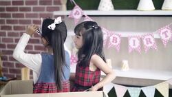 Babies having fun in cardboard boxes and playing hide and seek Stock Footage