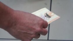 CLEAN : Lottery hopefuls flock to 'lucky' California store as $1bn jackpot looms News Clip