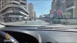 Driving through a city in Lebanon devastated by Israeli airstrikes News Clip
