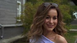 SLOW MOTION: Video portrait of a young woman with brown hair. Stock Footage