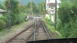 Hakone Tozan Mountain Train Passing Trough Small Stations, Tunnels And Winding Through A Narrow, Densely Wooded Valley In Hakone, Japan Stock Footage