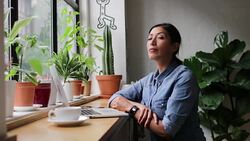 Portrait of freelance businesswoman working in a cafe Stock Footage
