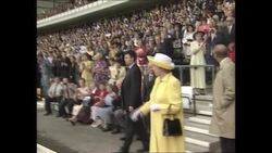 The Queen walking out of the tunnel at Pride Park News Clip
